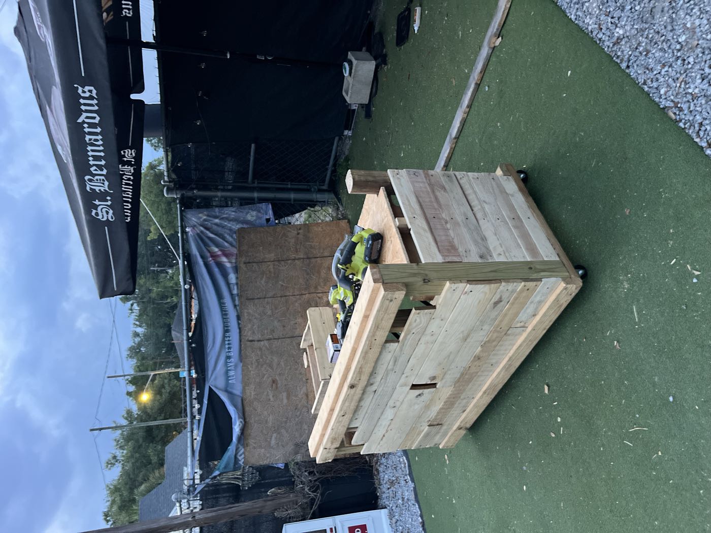 The booth closed in with cladding, drills resting on top